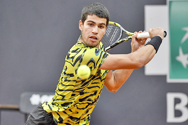 Alcaraz wins Italian Open debut to regain No. 1 and secure Roland