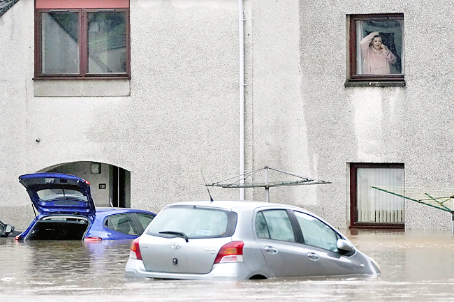 One dead after gale-force winds, floods strike northern Europe | Borneo ...