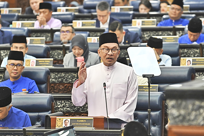 Malaysia Unveils New Taxes, Subsidy Cuts In Leaner 2024 Budget | Borneo ...