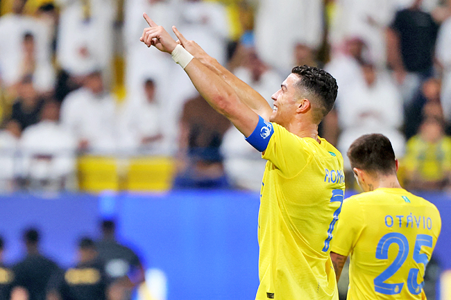 Players of Saudi Arabia's Al Hilal react after their team was defeated by  Japan's Urawa Red Diamonds after the AFC Champions League final match at  Saitama Stadium in Saitama, near Tokyo, Saturday