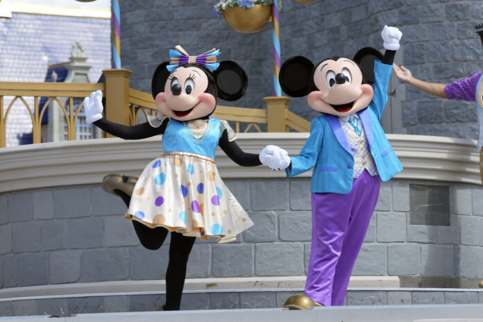 Mickey and Minnie mouse are showing the principle of unity. Description  from …