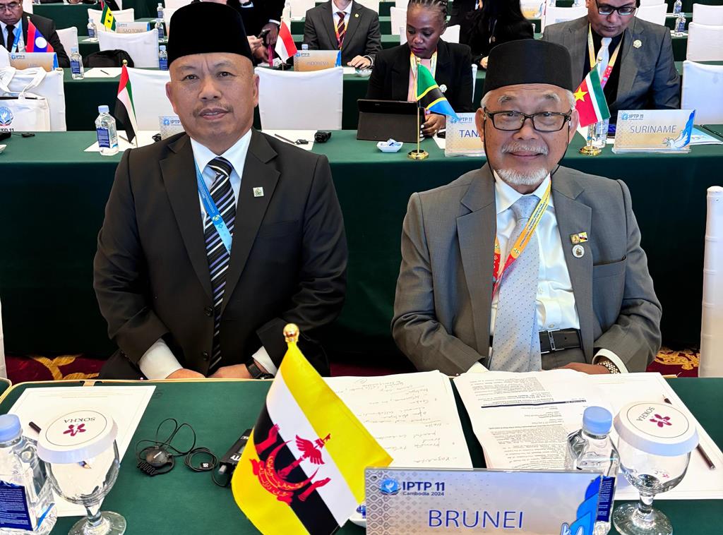 Yang Berhormat Dr Awang Haji Mahali and Yang Berhormat Awang Amran representing Brunei at the IPTP plenary